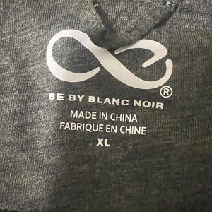 Green Vest. XL but better suited to a Large.